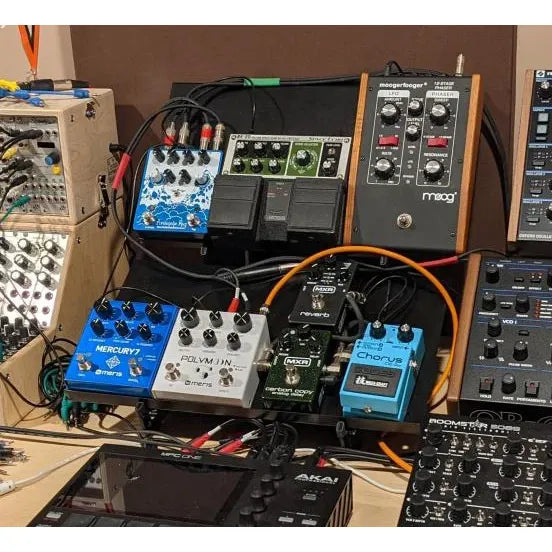 Two SynthRISE Expansion Shelves Large on stand with synth gear